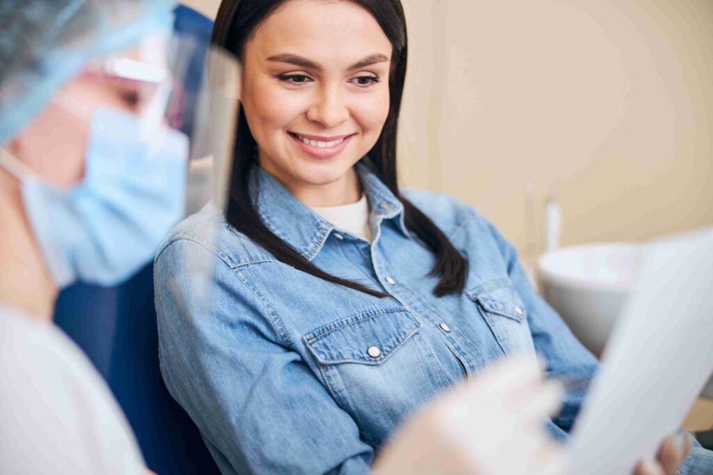 Patient reviewing treatment information with a dental professional.